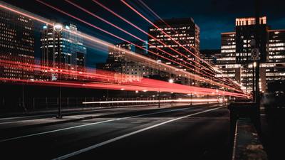 a long exposure photo of a city at night