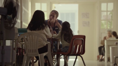 a group of people sitting around a table