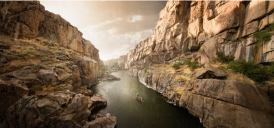 a river running through a rocky canyon next to a cliff