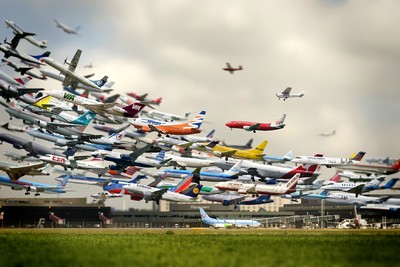 a bunch of airplanes that are flying in the sky