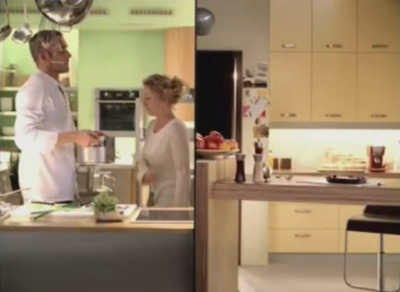 a man and a woman in a kitchen preparing food