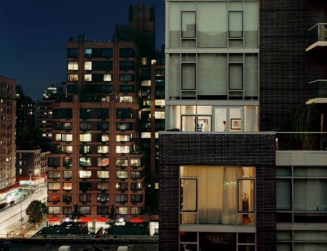 a view of a city at night from a high rise building