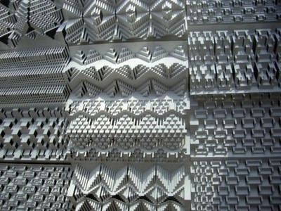 a wall made up of metal squares and squares