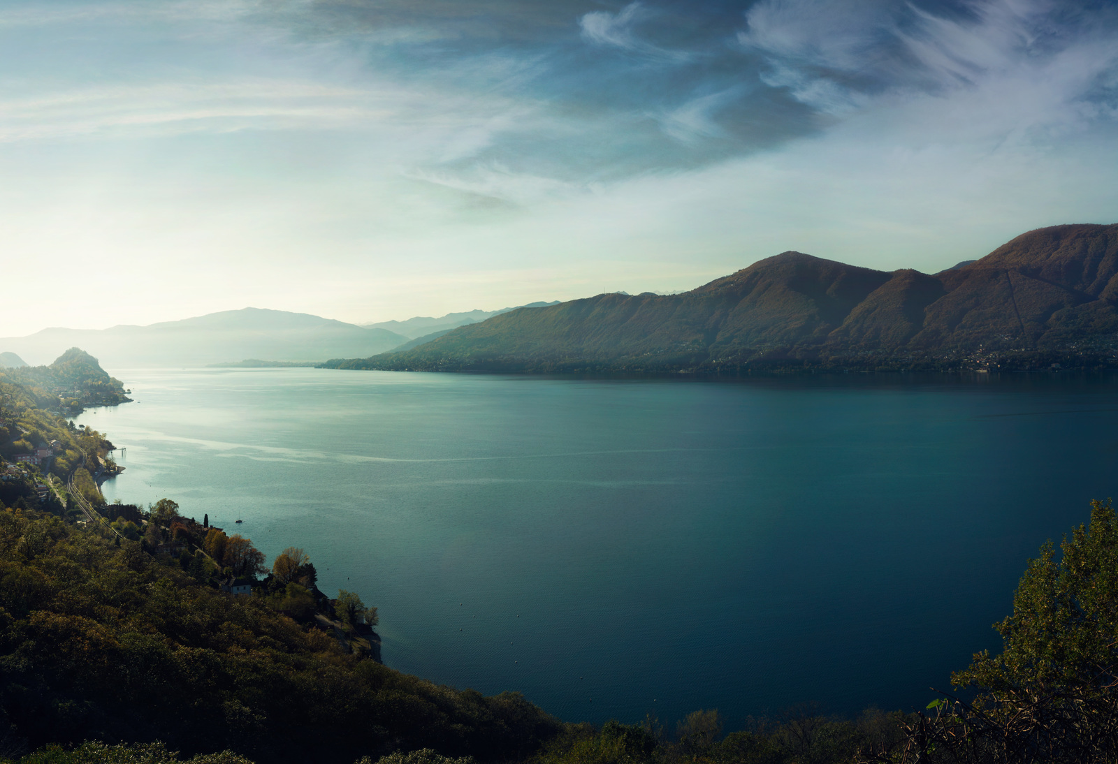 a large body of water surrounded by mountains