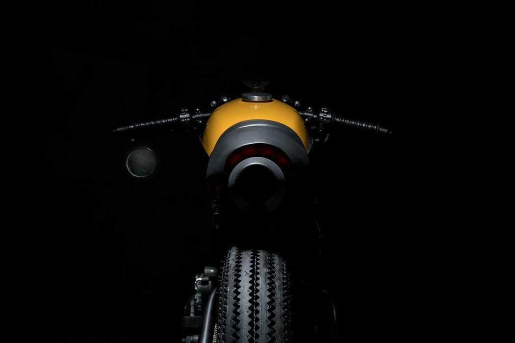 a yellow and black motorcycle in the dark