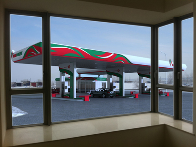 a view of a gas station from a window