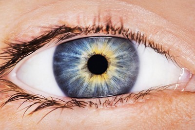 a close up of a person's blue eye