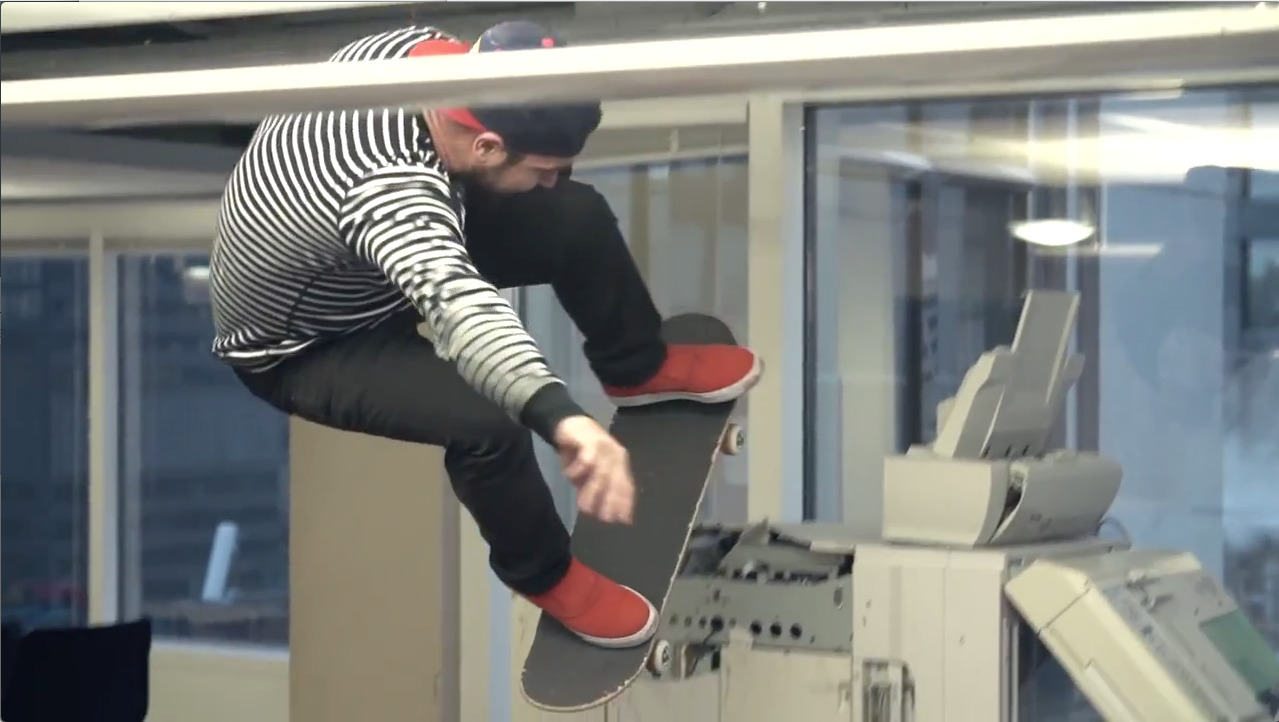 a man riding a skateboard up the side of a ramp