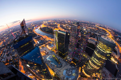 an aerial view of a city at night