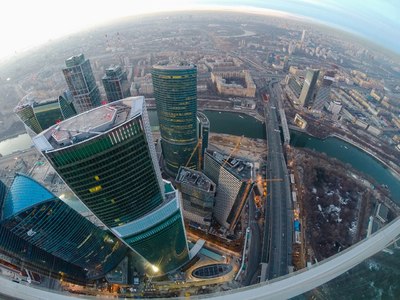 an aerial view of a city with a lot of tall buildings