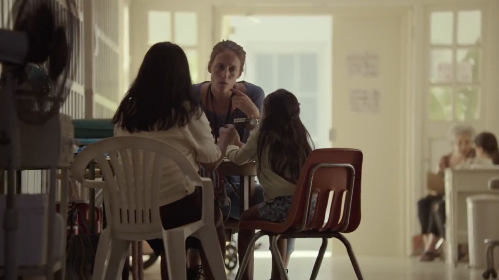 a group of women sitting around a table