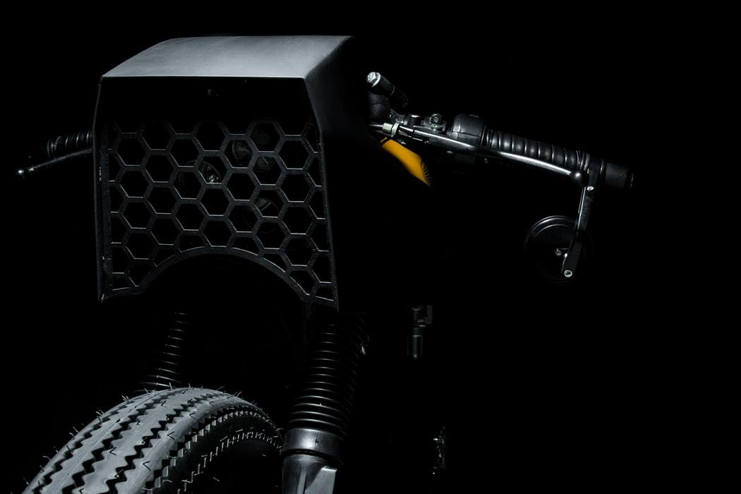 a close up of a motorcycle with a black background