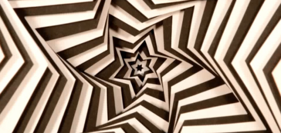 a black and white image of a star in a spiral pattern