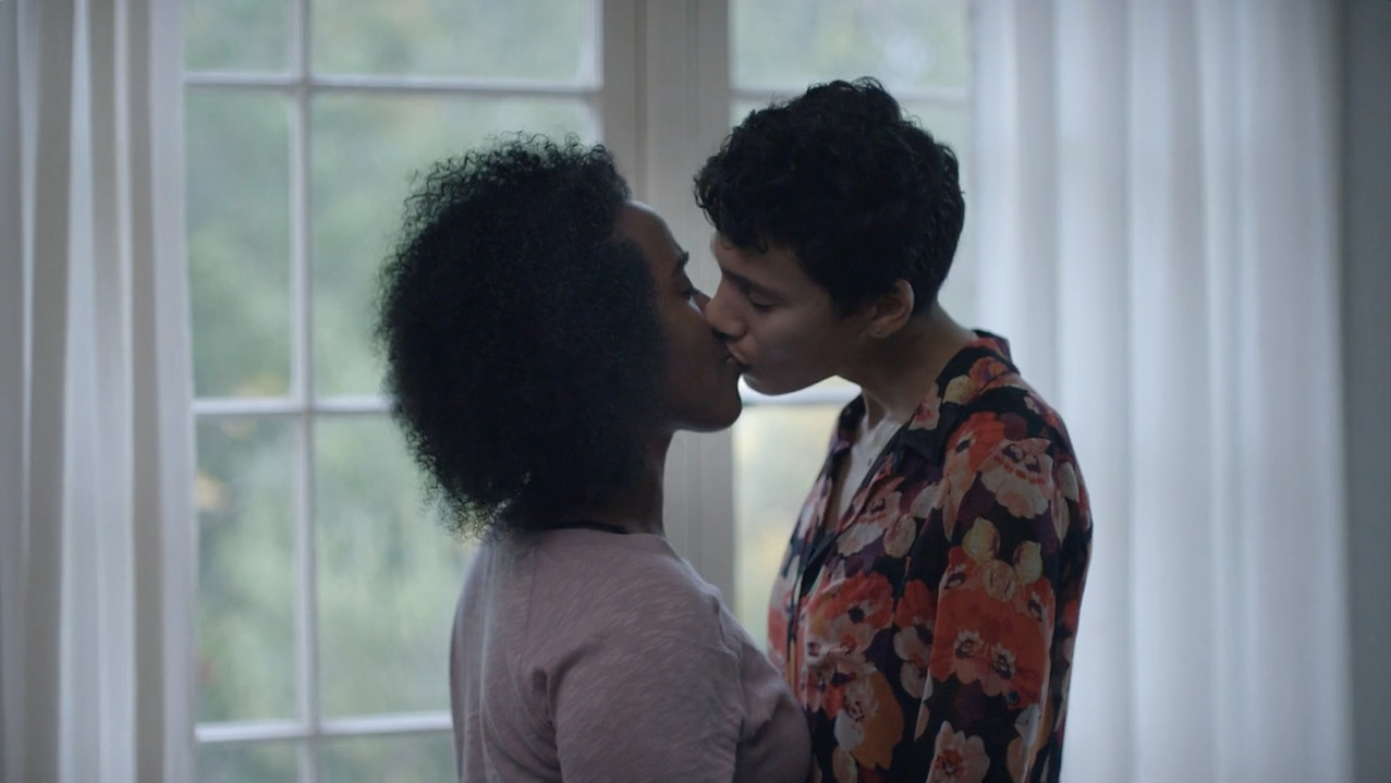 a couple of women standing next to each other