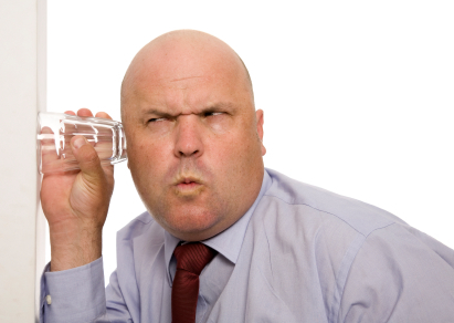 a man with a glass of water in his hand