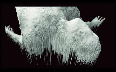 a black and white photo of a large iceberg