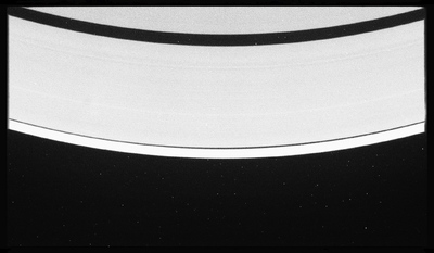 a black and white photo of saturn taken from space