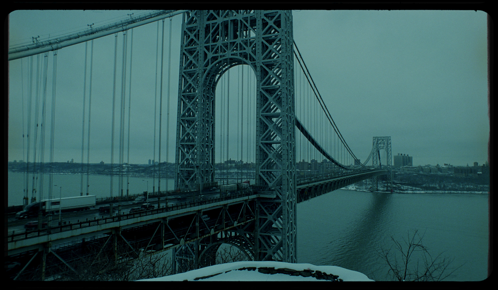 a view of a bridge over a body of water