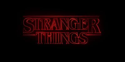 a red neon sign that says,'strange things '