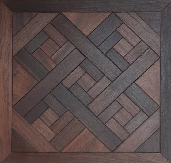 a wooden frame with a pattern on it