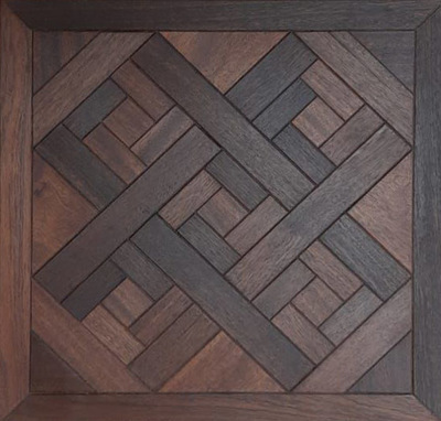 a wooden frame with a pattern on it