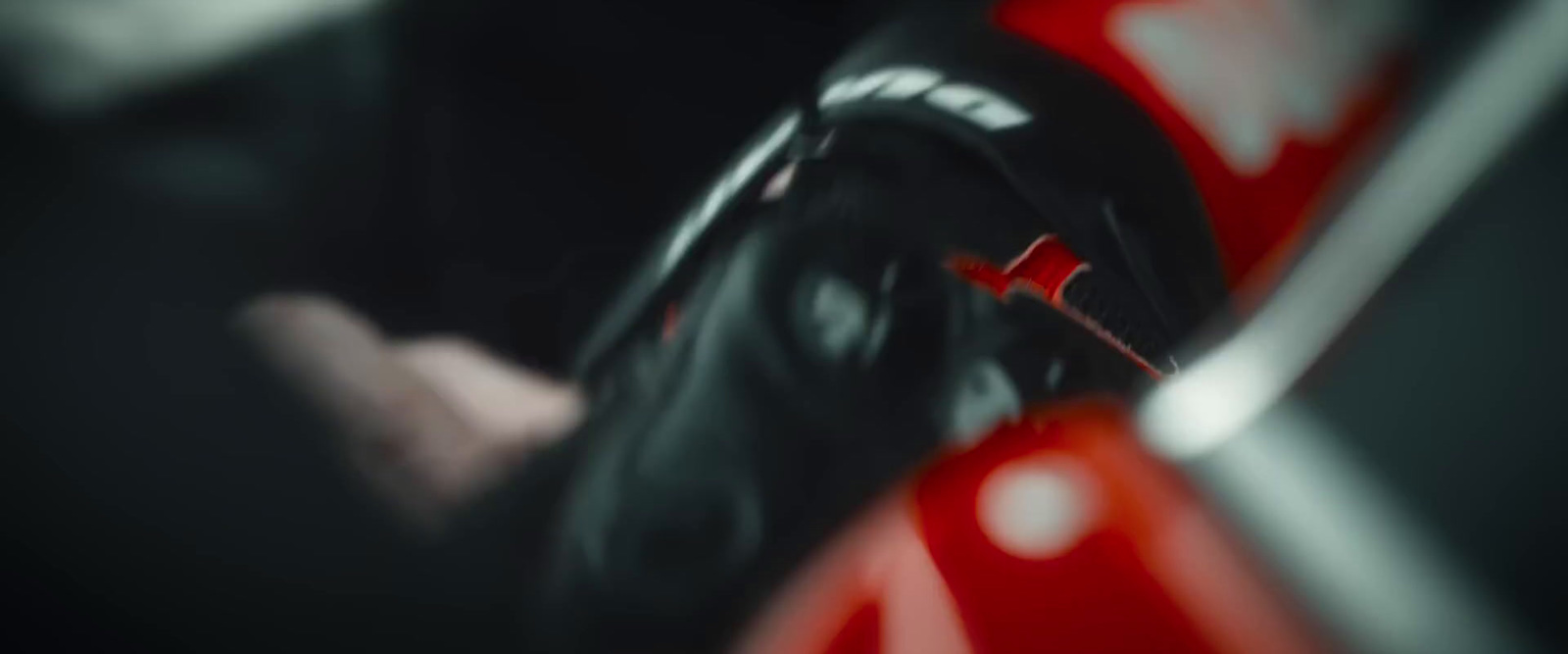 a close up of a red and black motorcycle