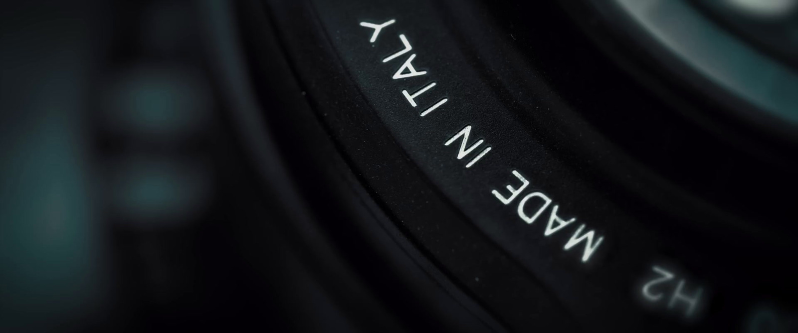 a close up of a camera lens with words on it