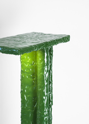 a green table that has been made to look like a piece of art