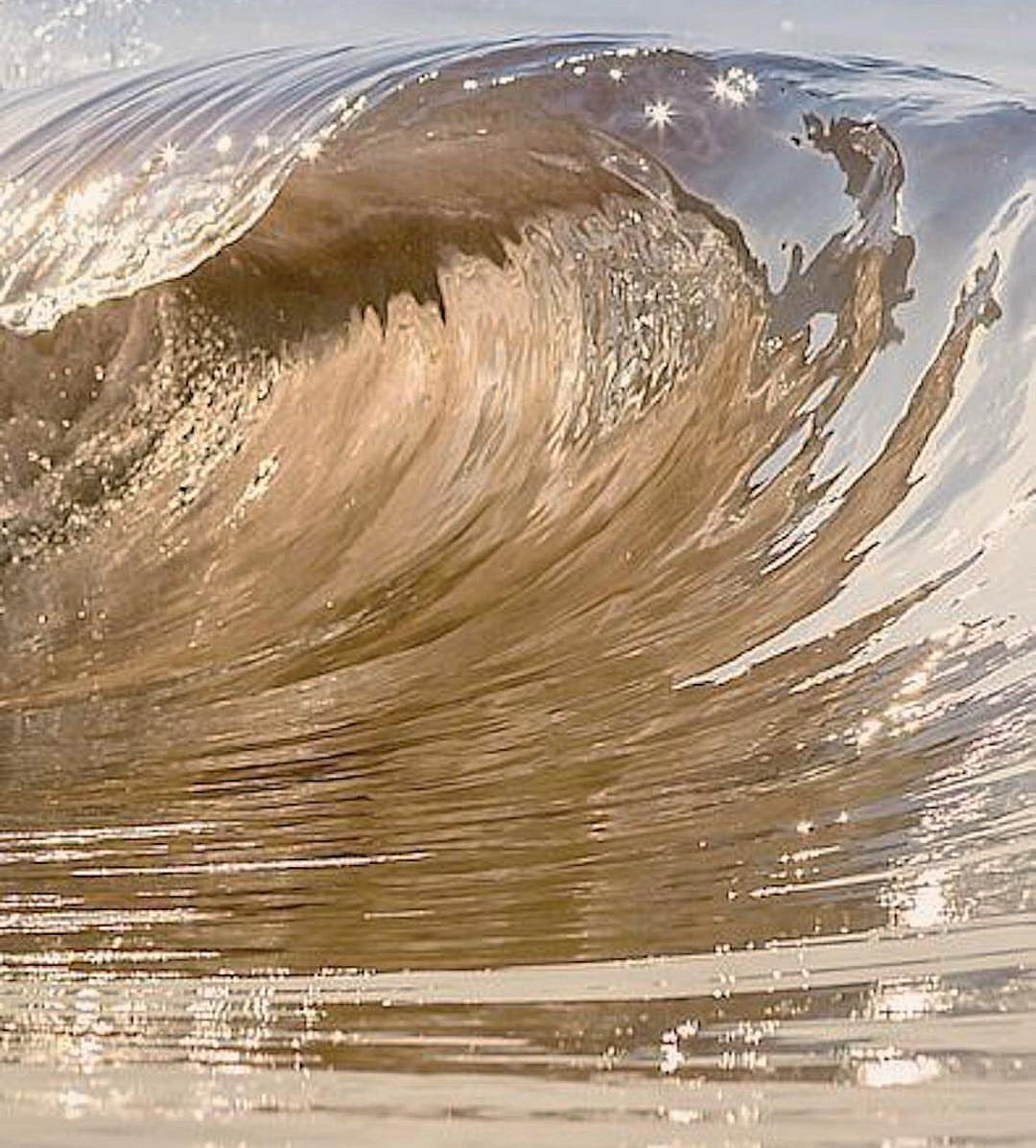 a close up of a wave in the ocean