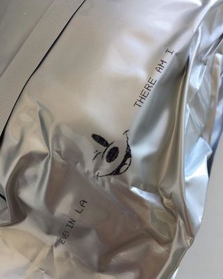 a close up of a bag with a logo on it