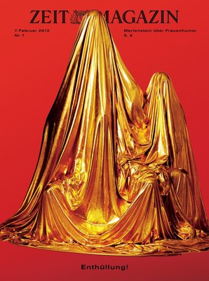 a gold cloth draped over a red background