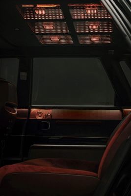 the interior of a vehicle with red lights