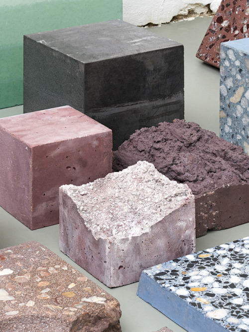 a group of different colored blocks sitting on top of a table