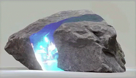 a rock with a blue light coming out of it