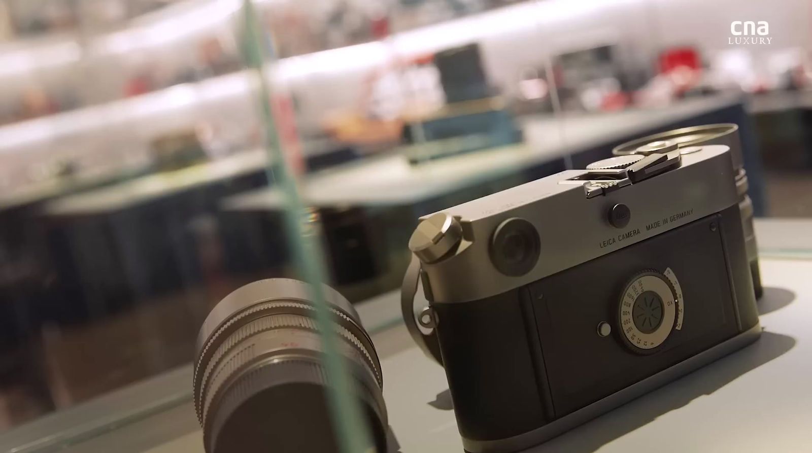 a camera sitting on top of a table next to a window