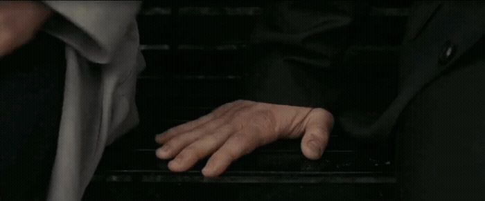 a person with their hand on a keyboard