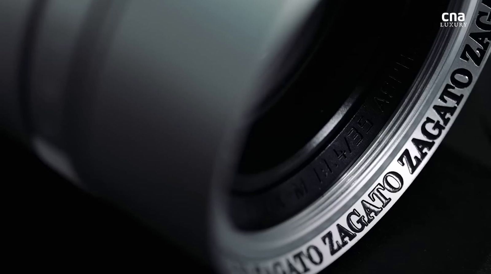 a close up of a tire on a black surface