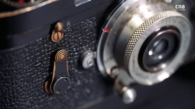 a close up of an old fashioned camera