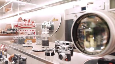 a camera sitting on top of a counter next to a shelf