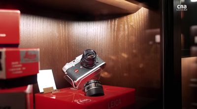 a camera sitting on top of a red box