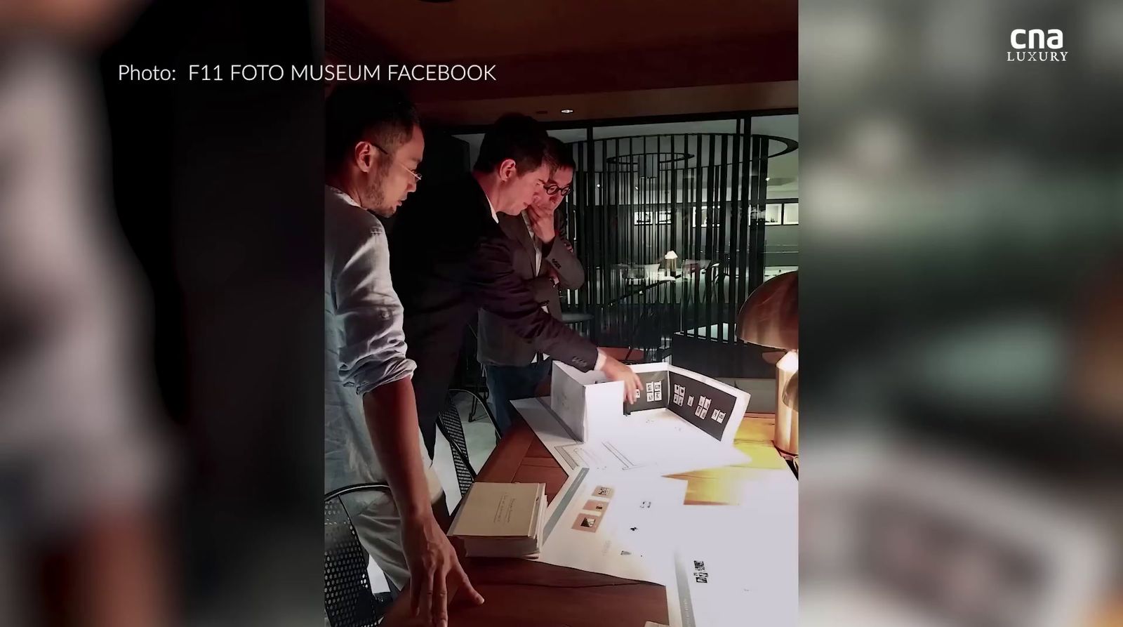 a couple of men standing next to each other