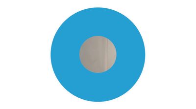 a blue circle with a white center on a white background