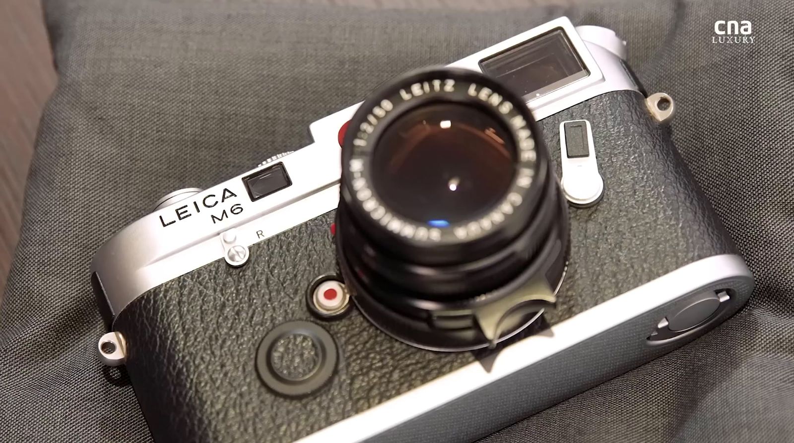 a camera sitting on top of a couch