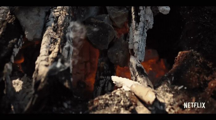 a close up of a pile of wood