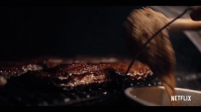 a close up of food being cooked in a pan