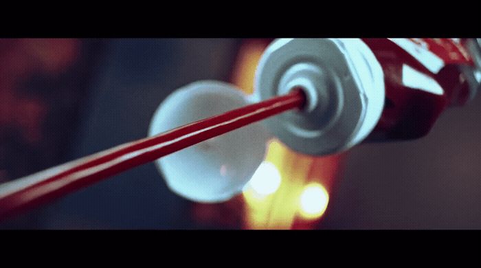 a close up of two red and white candy canes