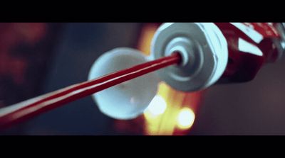 a close up of two red and white candy canes