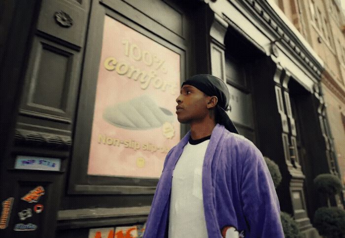 a man standing in front of a store