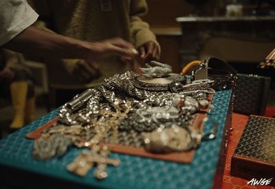 a table topped with lots of silver items