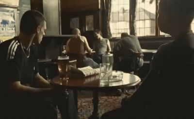 a group of people sitting around a table